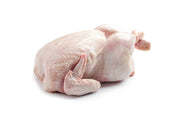 A raw whole chicken displayed on a white background.