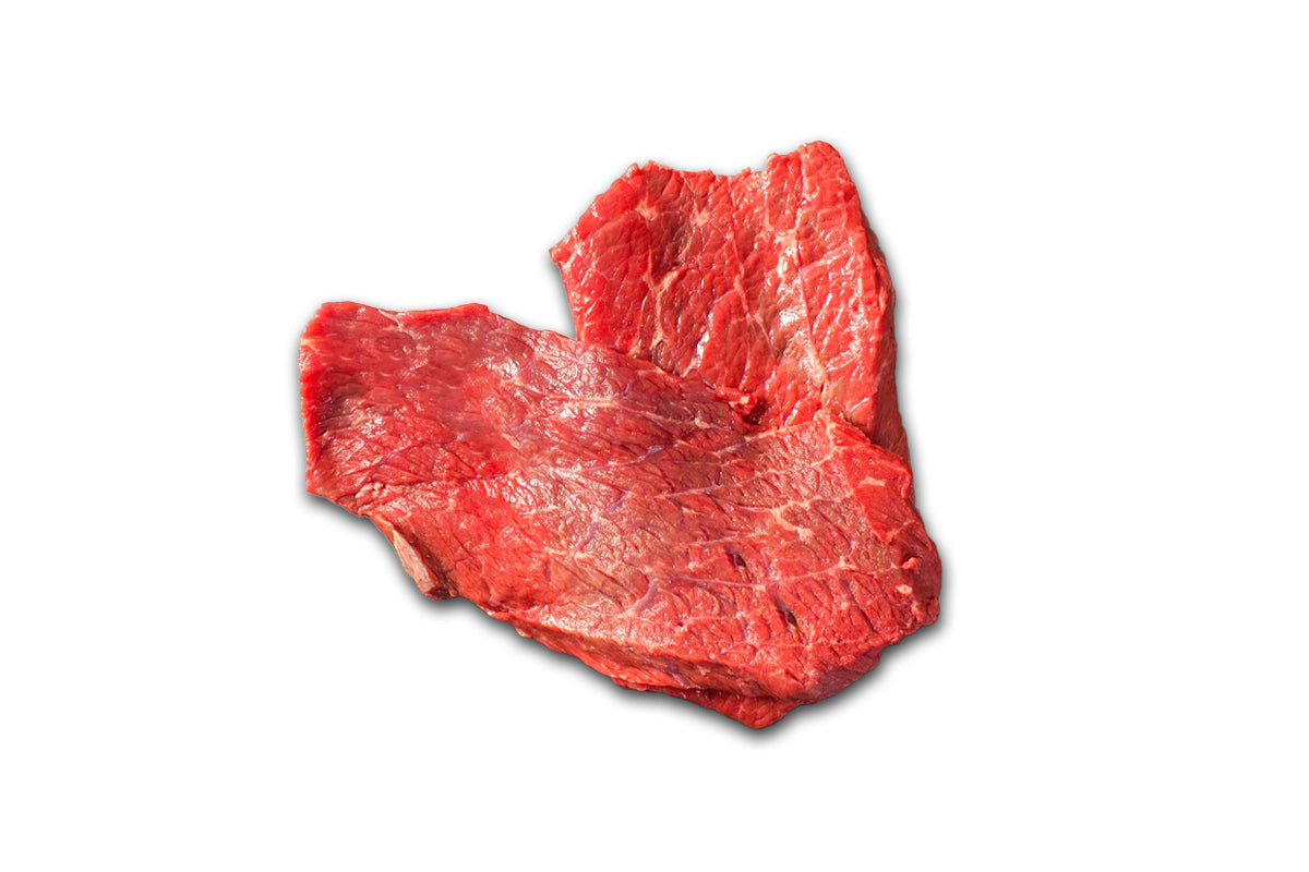 A single raw boneless beef steak with a red color, isolated on a white background.